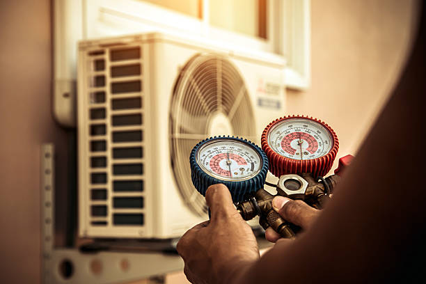 Professional Air Conditioning Service technician working in Mound, MN